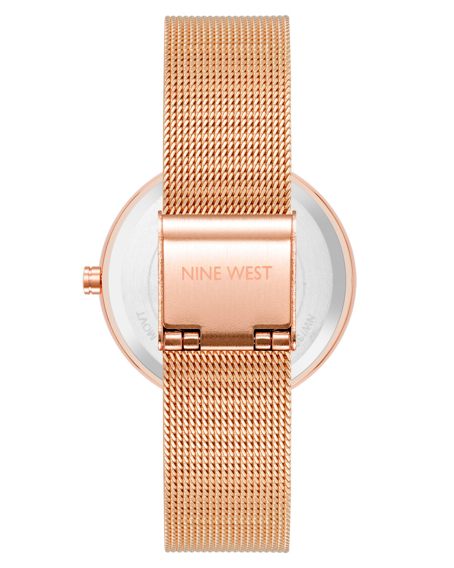armbanduhr mit mesh-armband und floralem zifferblatt